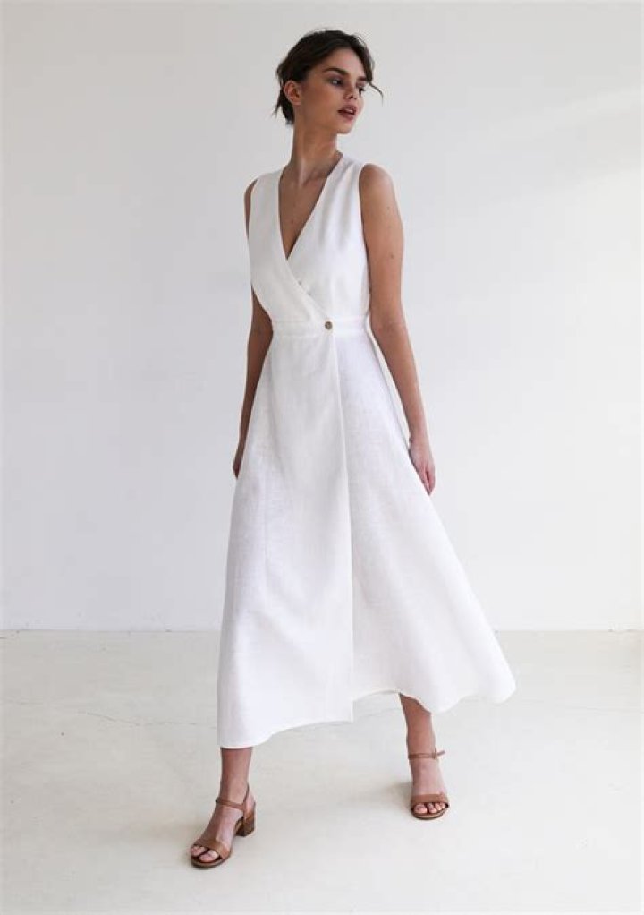 Elegant white linen boho maxi dress for summer beach ceremony